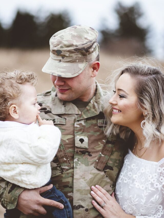 Young family portrait - a soldier father holding his son and a beautiful young wife | Ginger Varga | Ginger Varga Young family portrait - a soldier father holding his son and a beautiful young wife